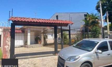 Casa 4 dormitórios I vaga 8 carros I Bairro Camaquã