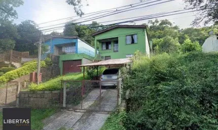Casa 280m² - 5 dormitórios, 4 banheiros, 2 vagas no bairro Cascata