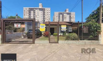Casa com 4 quartos à venda na Rua Teotônia, 313, Camaquã, Porto Alegre