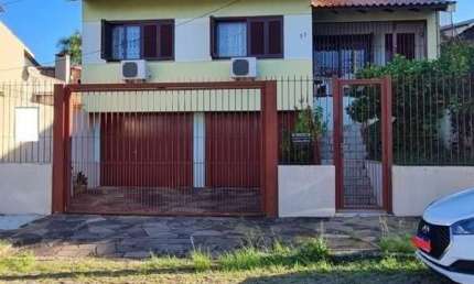 Casa 4 dormitórios à venda Partenon Porto Alegre/RS