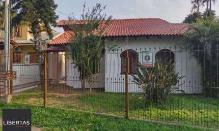 Casa com 4 quartos para alugar na Avenida Guarujá, 199, Guarujá, Porto Alegre
