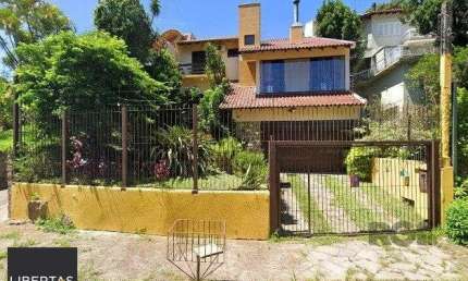 Casa 4 dormitórios à venda Teresópolis Porto Alegre/RS