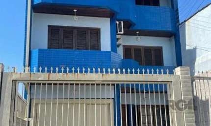 Casa 420m², 4 dormitórios, 3 vagas no bairro Partenon