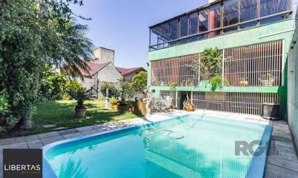 Casa 470m² - 4 dormitórios, 5 vagas no bairro Jardim São Pedro