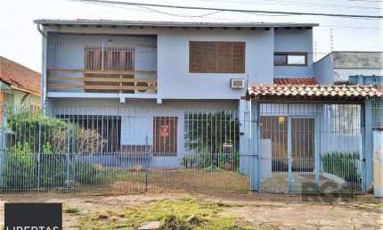 Casa com 3 quartos à venda na Rua Vítor Valpírio, 489, Anchieta, Porto Alegre