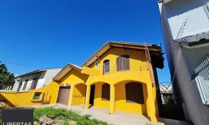 Casa com 3 quartos à venda na Rua Alfredo Silveira Dias, 169, Nonoai, Porto Alegre