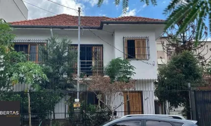 Casa de 4 dormitórios no bairro Santo Antônio, Porto Alegre