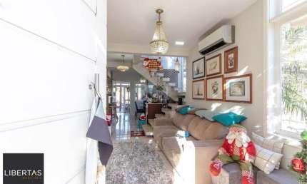 Casa com 4 quartos à venda na Avenida Edgar Pires de Castro, 540, Hípica, Porto Alegre