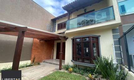 Casa com 3 quartos à venda na Rua Roberto Santini, 194, Hípica, Porto Alegre