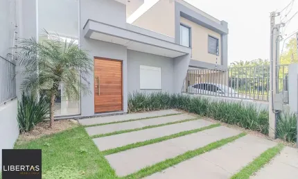Venda de casa nova com suíte, churrasqueira e garagem