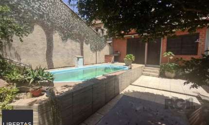 Casa com 4 quartos à venda na Rua Laguna, 181, Cavalhada, Porto Alegre