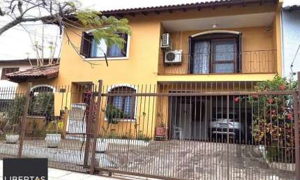 Casa 5 dormitórios à venda Campo Novo Porto Alegre/RS