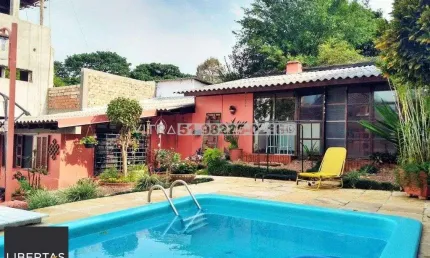 Casa com 6 quartos à venda na Avenida Arnaldo Bohrer, 171, Teresópolis, Porto Alegre