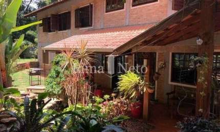 Casa em Condomínio com 611 m²,6 quartos,5 suites,8 banheiros,4 vagas