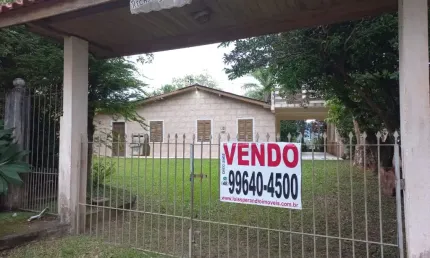 OPORTUNIDADE ÚNICA E  PREVILIGIADA ... TERRENO COM 1,060  M² E CASA COM 130 M² E VISTA PARA O MAR.