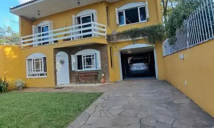 Casa com 4 quartos à venda na Rua Buttenbender,56, --, Fátima, Canoas