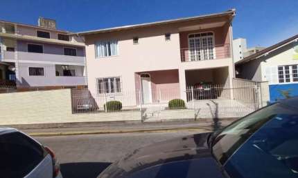Casa com 4 quartos à venda no Centro, Biguaçu  por R$ 860.000