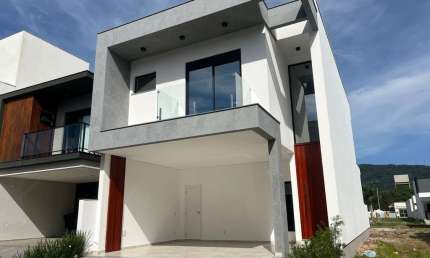 Casa em condomínio fechado com 3 quartos à venda em Deltaville, Biguaçu  por R$ 990.000