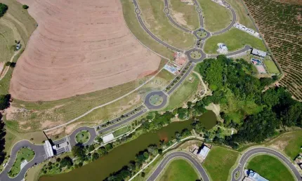 Terreno à venda no condomínio flor d´aldeia - aldeia dos pássaros ii em mogi mirim com 423m²