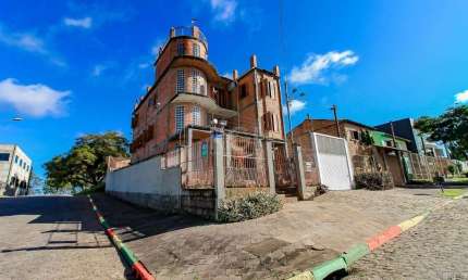 Casa com 5 quartos à venda na Rua Professora Ziláh Totta, Jardim Leopoldina, Porto Alegre