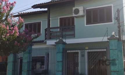 Casa com 4 quartos à venda na Rua Doutor Telmo Vergara, Partenon, Porto Alegre
