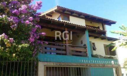 Casa em condomínio fechado com 4 quartos à venda na Rua Alcebíades Antônio dos Santos, Nonoai, Porto Alegre