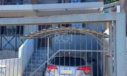 Casa em condomínio fechado com 2 quartos à venda na Rua Padre Hildebrando de Freitas Pedroso, Tarumã, Viamão