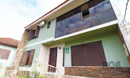 Casa com 5 quartos à venda na Travessa Luiz Tamanini, Teresópolis, Porto Alegre