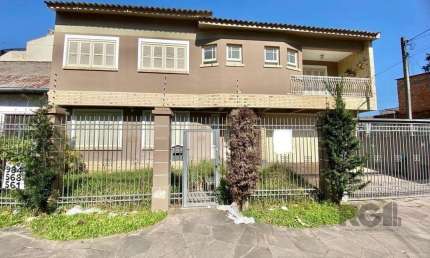 Casa com 4 quartos à venda na Rua Ari Marinho, Higienópolis, Porto Alegre