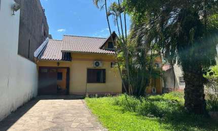 Casa com 4 quartos à venda na Avenida Farroupilha, Nossa Senhora das Graças, Canoas, 191 m2 por R$ 950.000