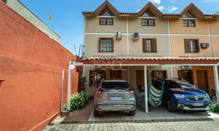 Casa em condomínio fechado com 3 quartos à venda na Rua Sílvio Silveira Soares, 2406, Camaquã, Porto Alegre por R$ 350.000