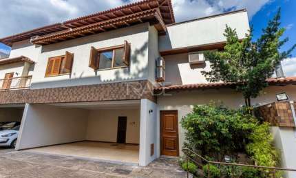 Casa em condomínio fechado com 3 quartos à venda na Travessa Pedra Redonda, 450, Jardim Isabel, Porto Alegre por R$ 1.540.000