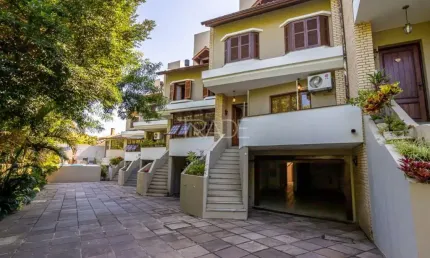 Casa em condomínio fechado com 4 quartos à venda na Rua Padre João Batista Reus, 438, Tristeza, Porto Alegre por R$ 1.490.000