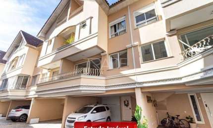 Casa em condomínio fechado com 3 quartos à venda na Avenida Coronel Marcos, 500, Pedra Redonda, Porto Alegre por R$ 990.000