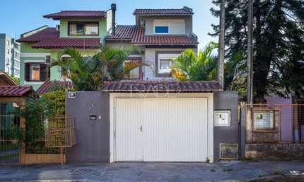 Casa com 3 quartos à venda na Travessa Nova Trento, 211, Tristeza, Porto Alegre por R$ 1.280.000