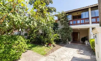 Casa em condomínio fechado com 3 quartos à venda na Avenida Eduardo Prado, 2050, Cavalhada, Porto Alegre por R$ 960.000