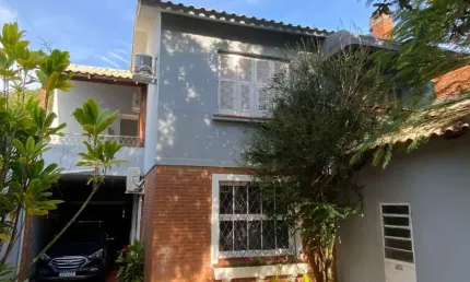 Casa com 4 quartos à venda na Rua Guaraum, 112, Vila Assunção, Porto Alegre por R$ 1.065.000
