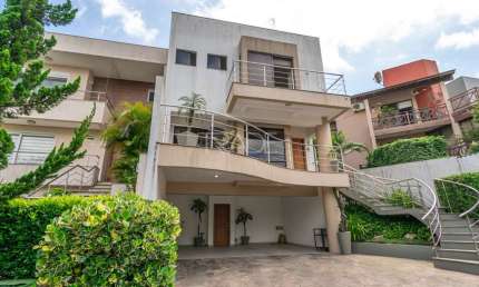 Casa em condomínio fechado com 3 quartos à venda na Avenida Edgar Pires de Castro, 540, Hípica, Porto Alegre por R$ 1.150.000