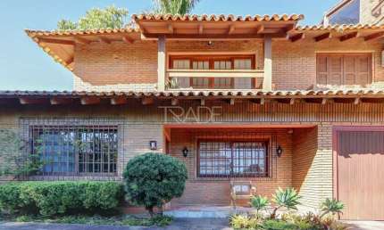Casa em condomínio fechado com 3 quartos à venda na Rua Carlos Júlio Becker, 295, Tristeza, Porto Alegre por R$ 820.000
