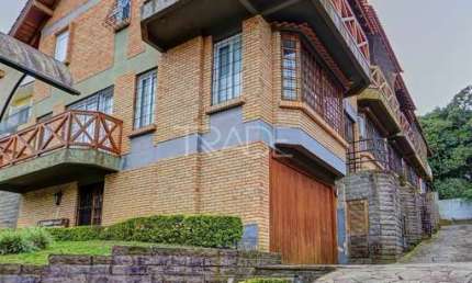 Casa em condomínio fechado com 3 quartos à venda na Rua Doutor Arnaldo da Silva Ferreira, 35, Jardim Isabel, Porto Alegre por R$ 800.000