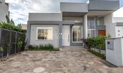 Casa em condomínio fechado com 3 quartos à venda na Rua Eroni Soares Machado, 300, Hípica, Porto Alegre por R$ 630.000
