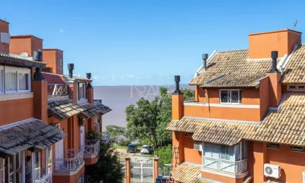 Casa em condomínio fechado com 3 quartos à venda na Avenida Guaíba, 4680, Vila Assunção, Porto Alegre por R$ 995.000