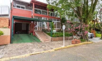 Casa em condomínio fechado com 3 quartos à venda na Rua Professor Antônio José Remião, 15, Espírito Santo, Porto Alegre por R$ 850.000