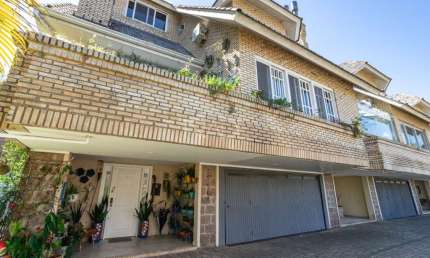 Casa em condomínio fechado com 5 quartos à venda na Rua Doutor Arnaldo da Silva Ferreira, 450, Jardim Isabel, Porto Alegre por R$ 1.600.000