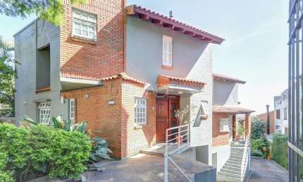 Casa em condomínio fechado com 3 quartos à venda na Rua Padre João Batista Reus, 1700, Tristeza, Porto Alegre por R$ 670.000