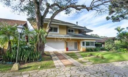 Casa em condomínio fechado com 4 quartos à venda na Avenida da Cavalhada, 5205, Cavalhada, Porto Alegre por R$ 2.940.000