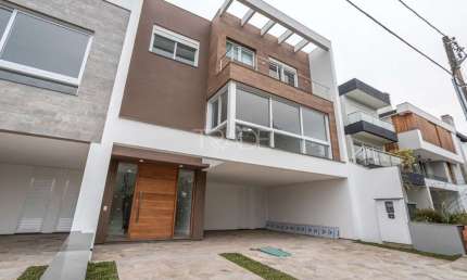 Casa em condomínio fechado com 3 quartos à venda na Rua Ivo Walter Kern, 599, Hípica, Porto Alegre por R$ 1.595.000