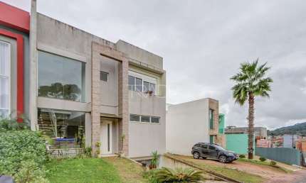 Casa em condomínio fechado com 3 quartos à venda na Avenida Juca Batista, 2705, Hípica, Porto Alegre por R$ 810.000