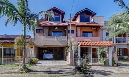 Casa em condomínio fechado com 3 quartos à venda na Rua Pau Brasil, 728, Hípica, Porto Alegre por R$ 495.000