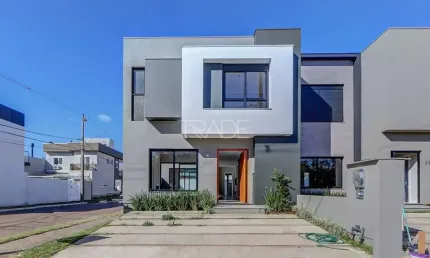 Casa em condomínio fechado com 3 quartos à venda na Rua Jean Vardaramatos, 130, Hípica, Porto Alegre por R$ 910.000
